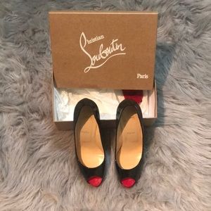 Slightly worn red bottoms